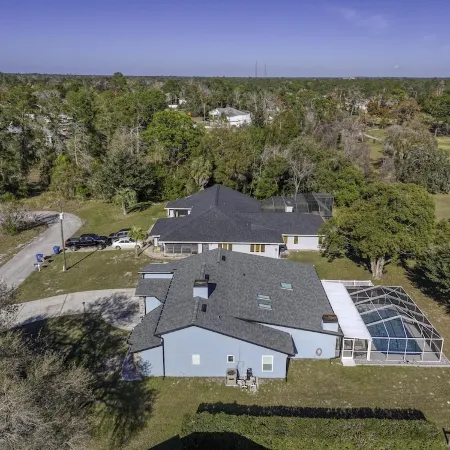 Four Beds, three baths, heated pool, and a Golf Course. What more do you need!!