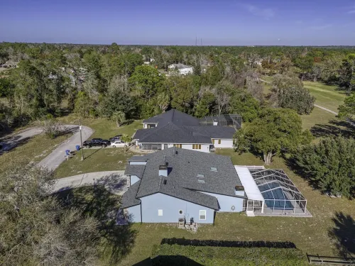 Four Beds, three baths, heated pool, and a Golf Course. What more do you need!!