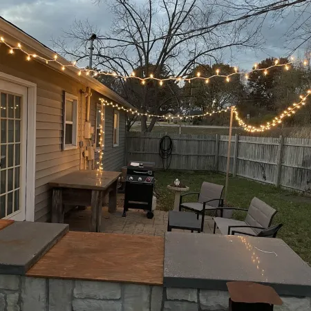 Near Kansas City Area Cottage with a Fire Pit! Comfy Beds and a Stocked Kitchen.