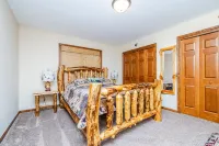 Elina’s  Log Cabin, new on the market, steps from Devil’s Lake State Park.