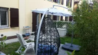 "The Little Garden," Studio apartment, garden and private parking space_Airport+Ducati Hotels in Borgo Panigale