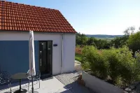Modern detached vacation home for two on the edge of the village in the Bavarian Rhön.