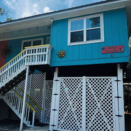 Island Paradise! Enjoy Our Duplex with a Pickleball Court and Basketball Hoop