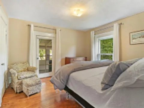 Historic house on tree lined red brick street of historic homes. Hotels in Racine