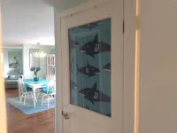 Beach and river view cottage with deck and specatuclar views.