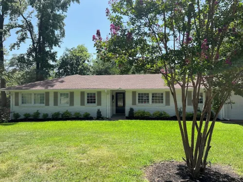 Beautifully updated 3bedroom 2 bath home with a large glassed in sunroom.