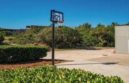 Polished condo with ocean views spanning Fort Macon & Cape Lookout Lighthouse!