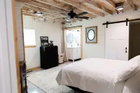 House on the lake with a large sandy beach just steps from the back door.