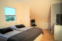 Modern, spacious vacation home - natural beach, space & tranquillity, fireplace Hotels in Dassow