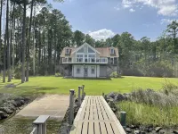 Riverfront Property with Dock and Ramp.  Dolphins, Fish, Boat, Swim & More