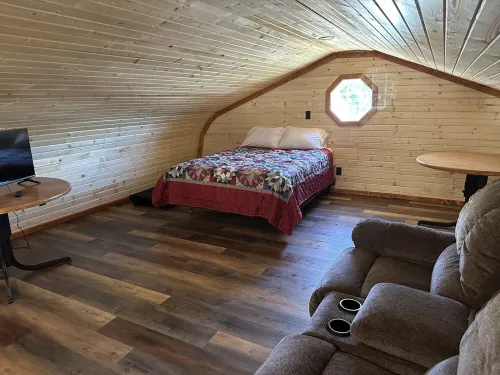 White cabin in the woods close to Univ. of Central Missouri and Whiteman AF Base