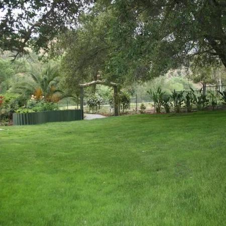 Center model of lux triplex with kaweah river running by property.
