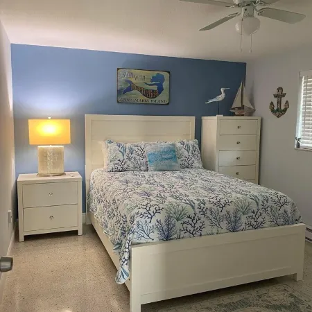 3 Minute walk to beautiful AMI beach! Old Florida Charm with a Modern Flair!