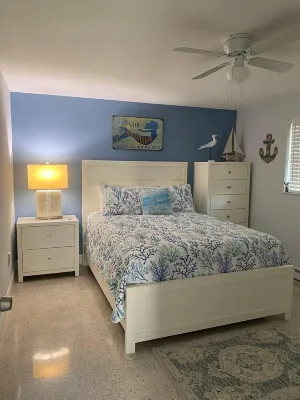 3 Minute walk to beautiful AMI beach! Old Florida Charm with a Modern Flair!