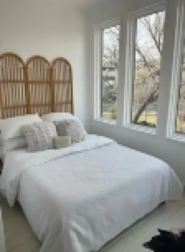 Unique two story house nestled 1 mile away from downtown.