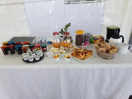 Hôtel le Soleil Couchant Отели в г. Манапани-Ле-Бэн