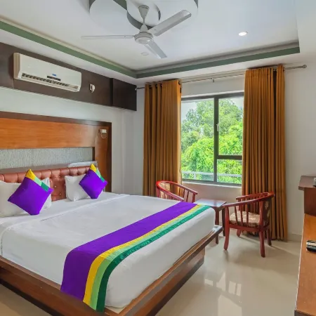 Treebo Premium Palmyra Milford, 2 Km from Alleppey Beach Отели рядом с достопримечательностью «Железнодорожный вокзал Аллеппи»