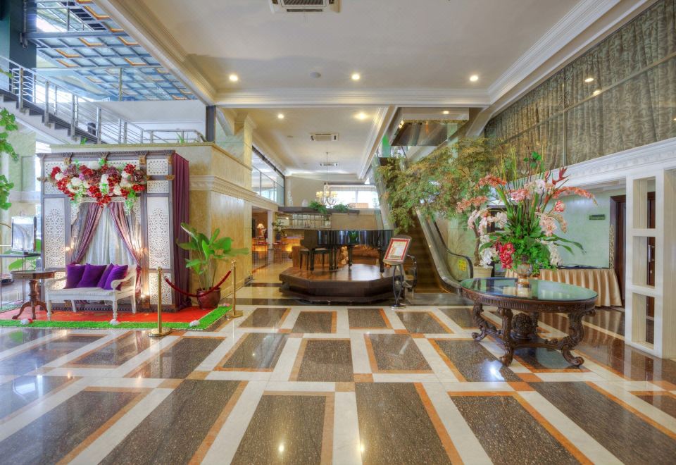 Amos Cozy Hotel MelawaiOver view