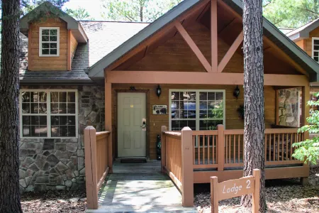 Rest Haven | Cabin in Branson West with fireplace, outdoor pool, tennis, golf