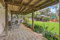 Charming Beach Retreat with Spacious Living and Fun Backyard - Delightful Escape