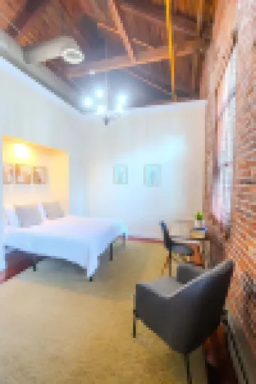 Private Patio and Historic Loft Feel - Charming Foundry Retreat