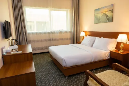 Three 888 Hotel Отели рядом с достопримечательностью «Шейх Мохаммед бен Рашид Центр культурной коммуникации»