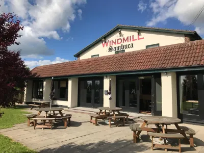 The Windmill Hotel Отели в г. 