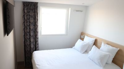 ダブルルーム コンフォート ホテル エアポート CDGの写真