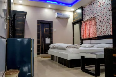 Kumar Hilife Hoteles cerca de Golden Lotus