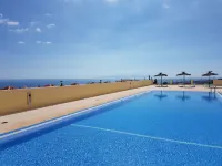 Villa Roque del Conde 3 with fantastic sea view, Terrace, Pool, Wifi, SAT-TV