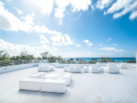 7 Mile Beach private Beach Club, ocean views from Roof deck and Pool Pavilion