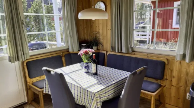 Holiday house with 3 bedrooms directly on the Useriner See with bathing beach, fireplace