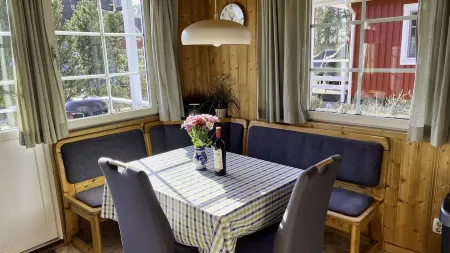 Holiday house with 3 bedrooms directly on the Useriner See with bathing beach, fireplace