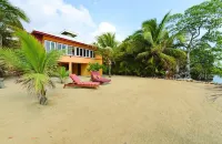 Entire Oceanfront Villa with Window Wall Porch and Private Beach