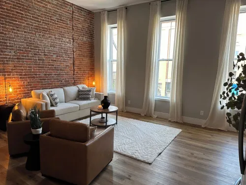 Stylish & Modern 2-Bdrm Apt in Downtown Warsaw featuring an urban rooftop deck.