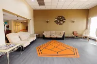 Garnet Inn & Suites, Orlando فنادق في Sky Lake