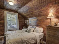 Amazing, sleeps 26, covered lakeside, bar, beach, Big St Germain Lake Hotels in St. Germain
