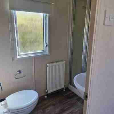 3 beds dog friendlyThe Lodge at Hafan Church Bay, Gadlys Coastal Cottages Group Rooms