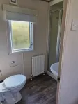 3 beds dog friendlyThe Lodge at Hafan Church Bay, Gadlys Coastal Cottages Group