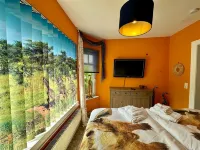 Lodge of Africa - Sauna, whirlpool & fenced garden 霍萊爾恩-特維倫夫萊特住宿飯店