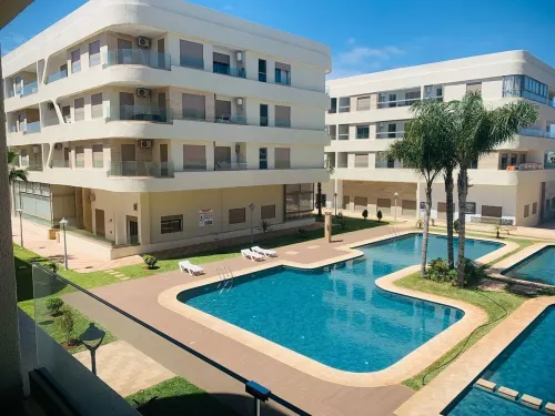 “Sunny 2BR Apartment in Bouznika – 2 min to Beach, A/C, WiFi, Family-Friendly” Hotels in Bouznika