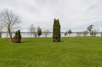 Victorian Riverfront 1BR • Cozy Retreat with River Views & Dock Access Hotels in Oswegatchie