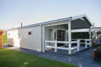 Comfortably Furnished Chalet with Porch Near Veluwe