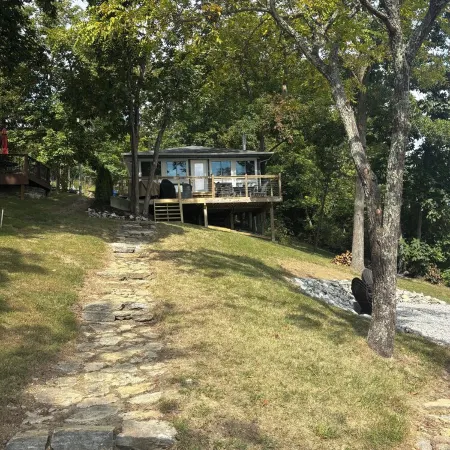 3-bedroom modern mid century cabin! Hot tub, fire pit and lake front