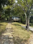 3-bedroom modern mid century cabin! Hot tub, fire pit and lake front