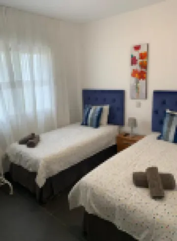 Charming Beachfront Bungalow in Torrox Costa - Perfect Family Retreat