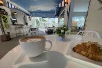 溫德姆戴斯飯店卡曼海灘 - 早餐