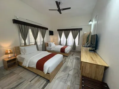Deluxe Stay Hotel di 