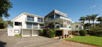 By the Bay Beachfront Apartments Hotels in Taipa