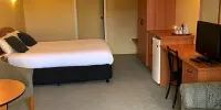 Hopkins House Motel & Apartments - Habitación De La Reina